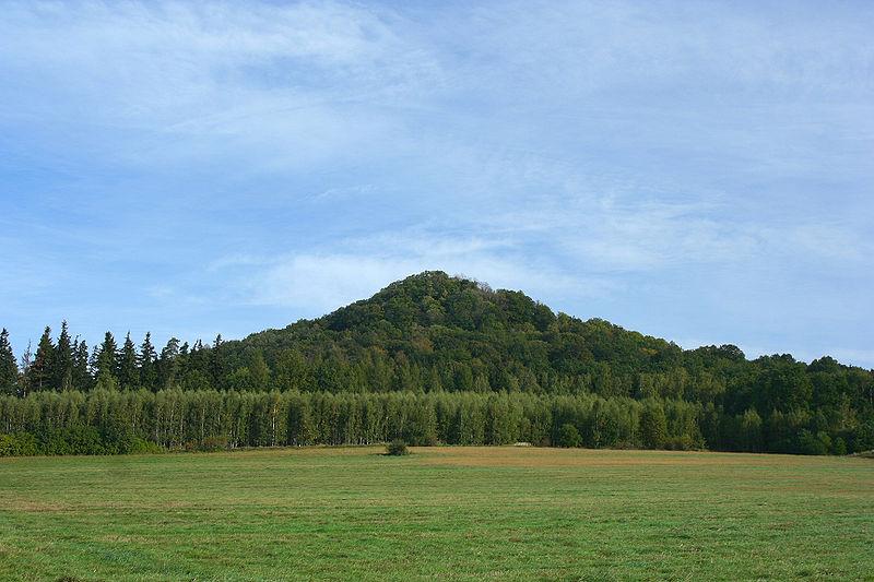 The cone-shaped Ostrzyca hill in the Land of Extinct Volcanoes